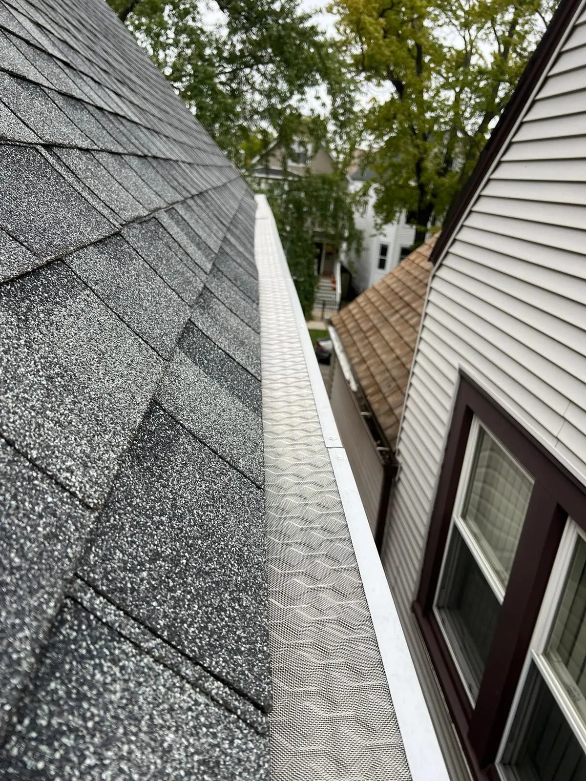Leaf filter gutter guard installation detail
